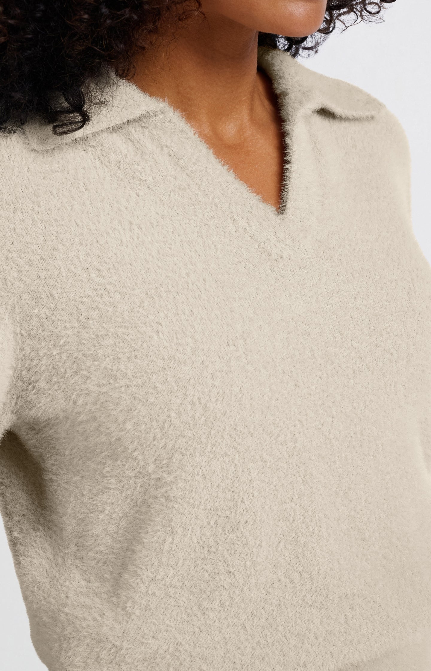 Fluffy polo sweater with classic collar and V-neck