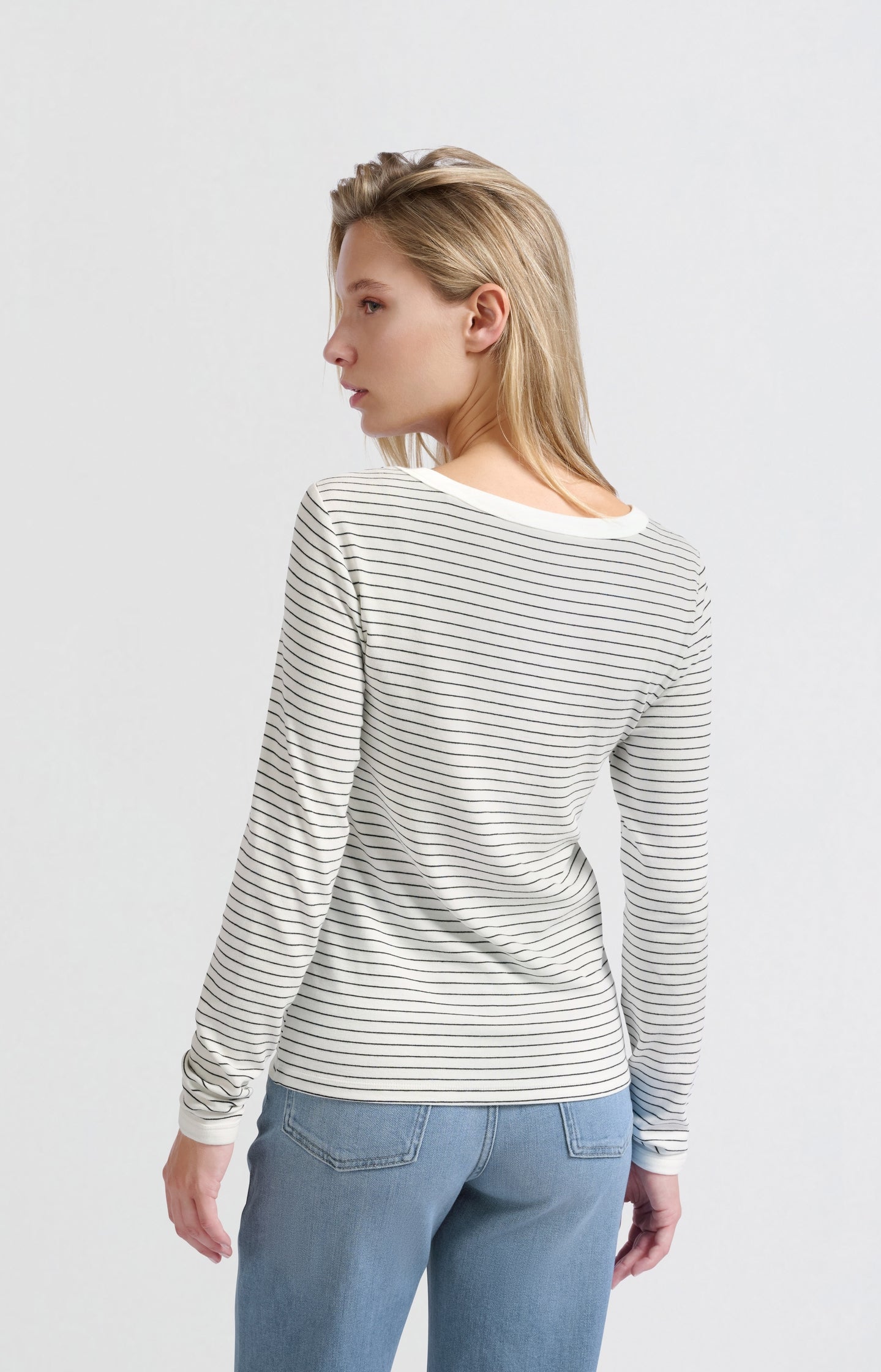 Striped top with long sleeves and center seam detail