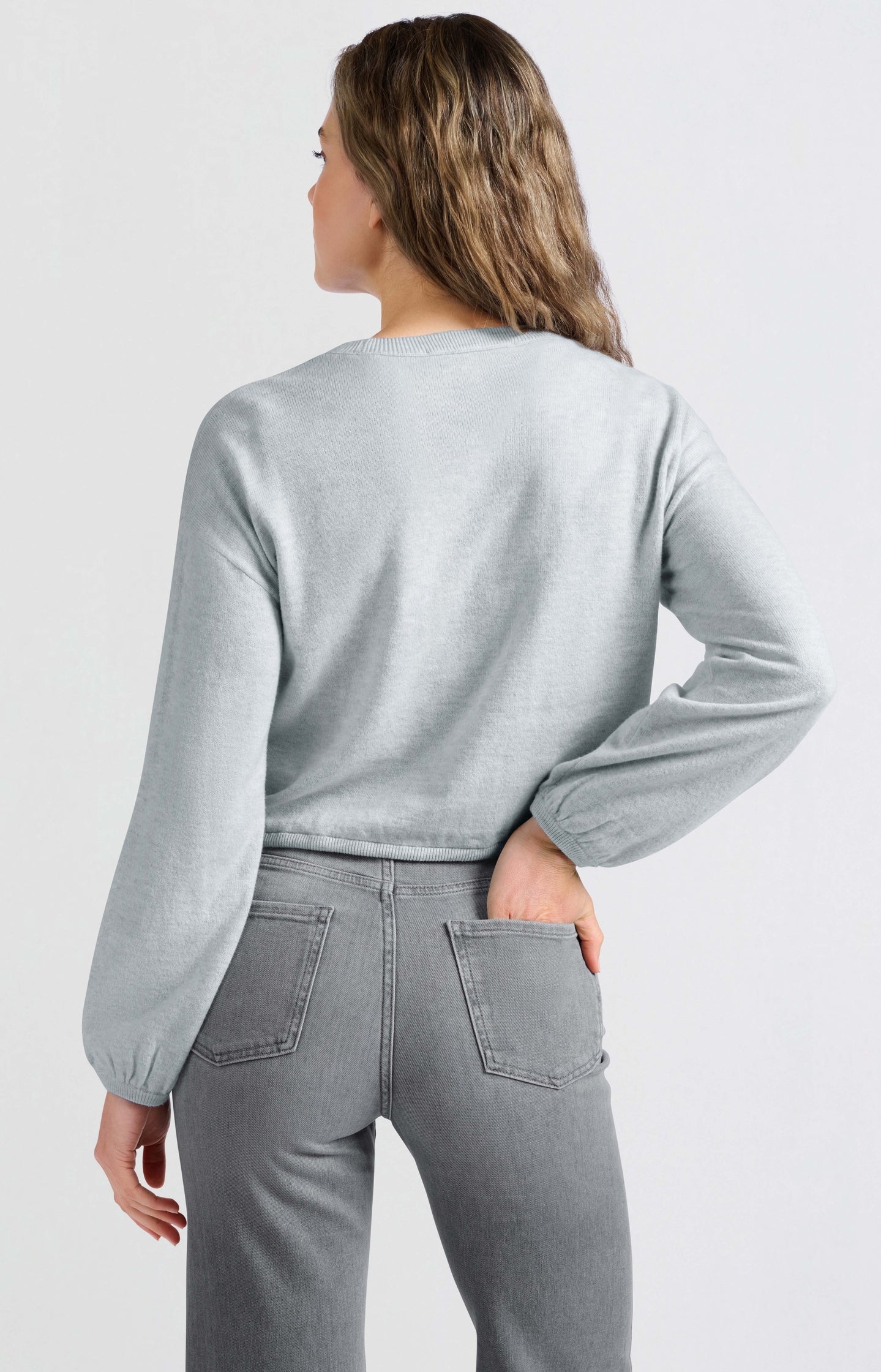 Sweater with corded hem and loose fit