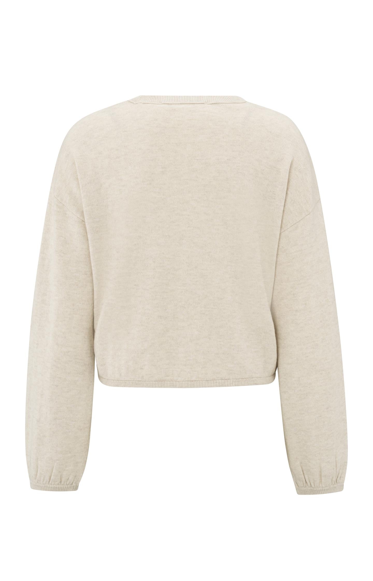 Sweater with corded hem and loose fit