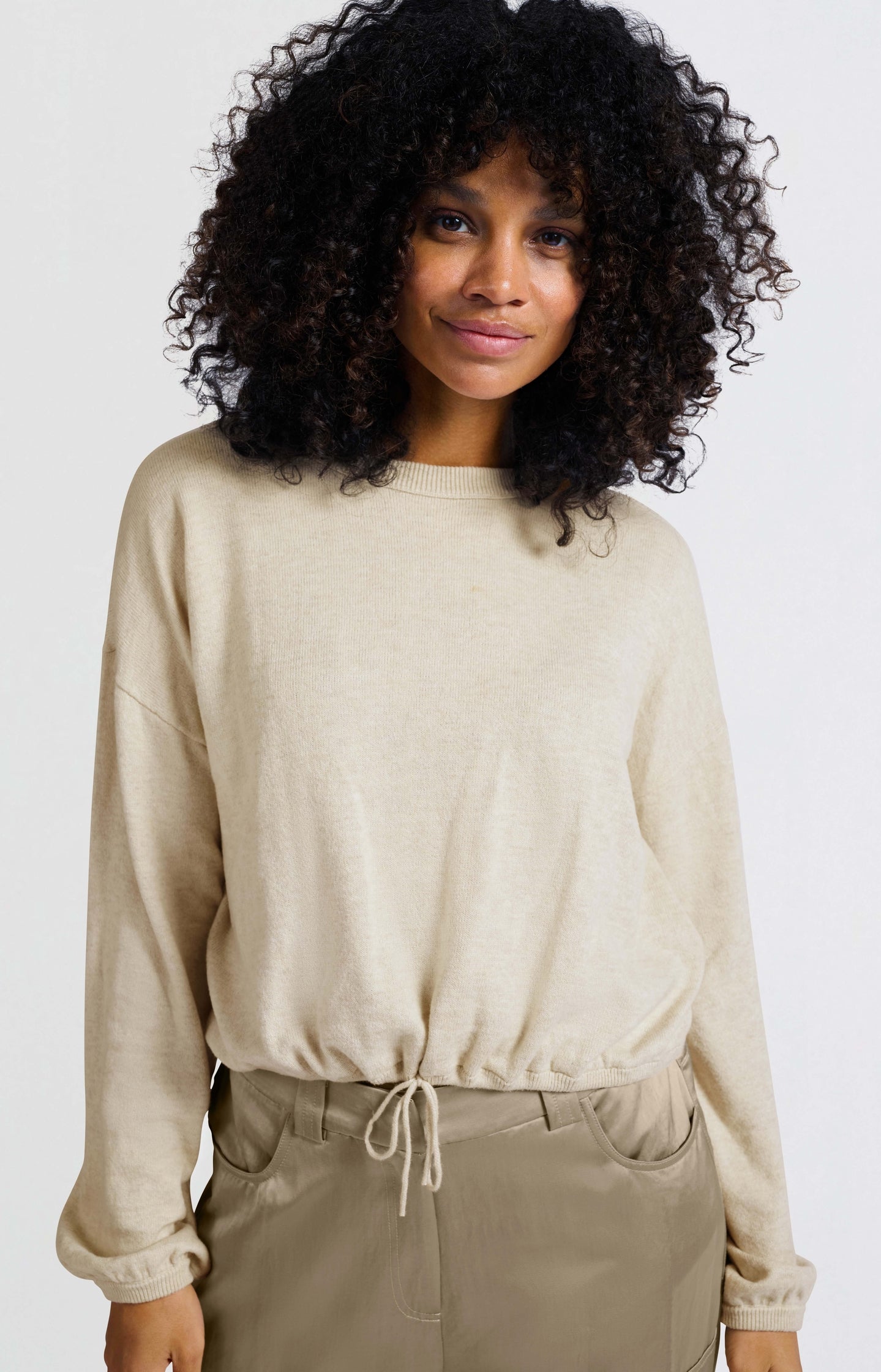 Sweater with corded hem and loose fit